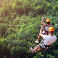 couple on zip line couple on zip line